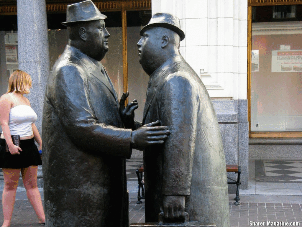 Statue of two men speaking